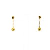 Boucles d'oreilles pendantes en or jaune avec perle d'or