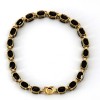 Bracelet pierres noires en or jaune