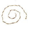 Collier en perles en or volutes en 8