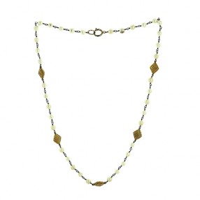 Sautoir Chanel Vintage en métal doré et perles