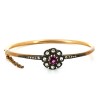 Bracelet rigide avec fleur en pierres precieuses