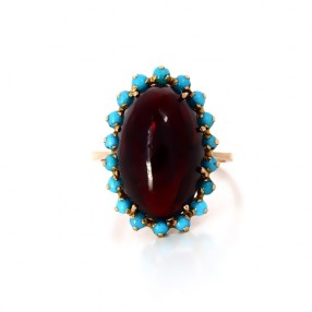 Bague en or jaune avec cabochon grenat et turquoises