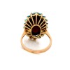 Bague en or jaune avec cabochon grenat et turquoises