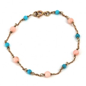 Bracelet avec perles bleues et roses