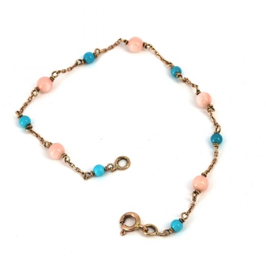 Bracelet avec perles bleues et roses