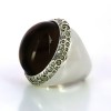 Bague Pomellato 67 en argent et agate teintée prune