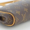 Pochette Louis Vuitton Eva en toile monogram