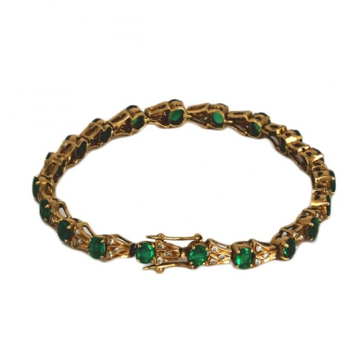Bracelet en or jaune 18k et émeraudes