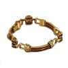 Bracelet moderne en or jaune, rubis et diamants