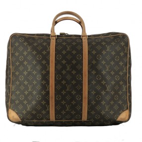 Sac de voyage Louis Vuitton...