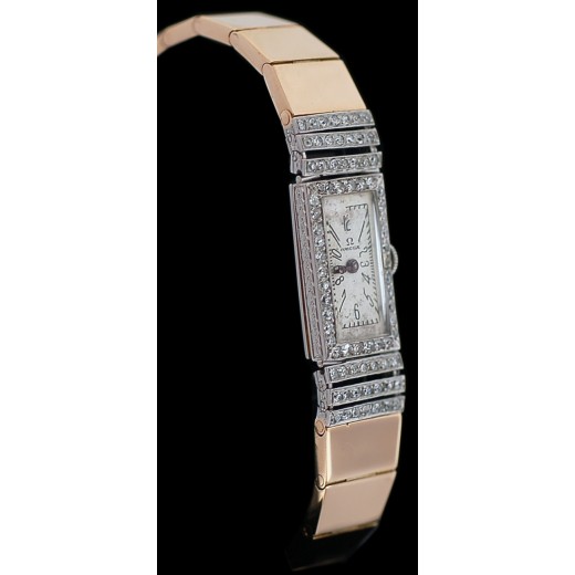 Montre OMEGA en or et diamants