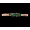 Bracelet jonc en or, émeraudes et diamants