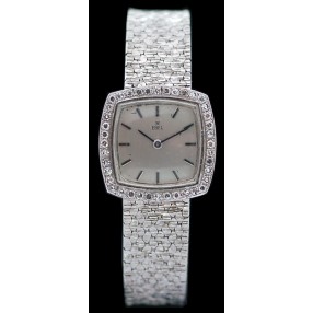 Montre Ebel en or blanc et lunette diamants