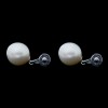 Boucles d'oreilles pendantes or blanc, perles de culture et diamants