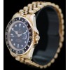 Montre Rolex GMT Master II 16718 en Or